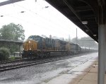 CSX 3265 leads M404 in pouring rain